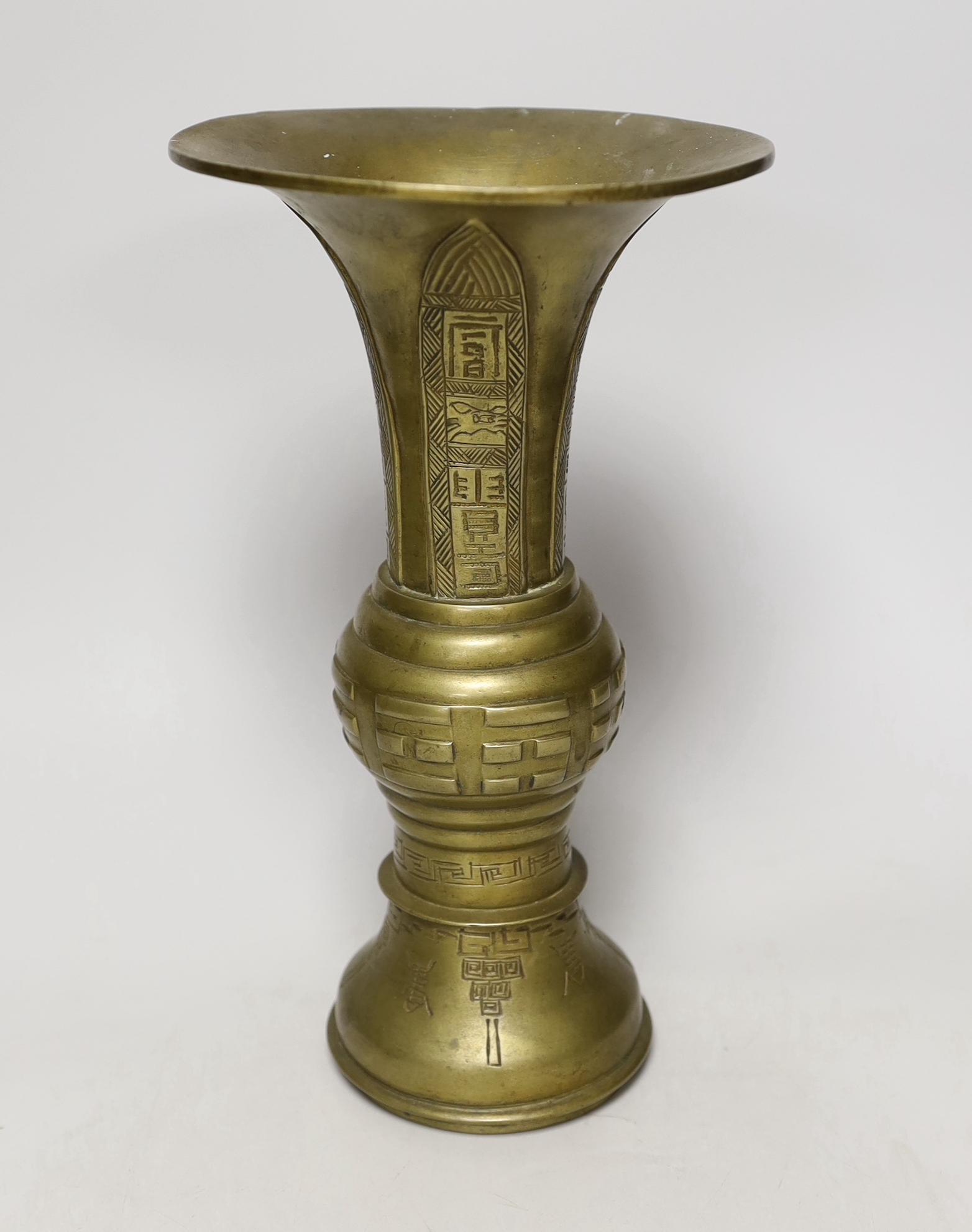 A Chinese bronze gu vase, early 20th century, 27.5cm tall